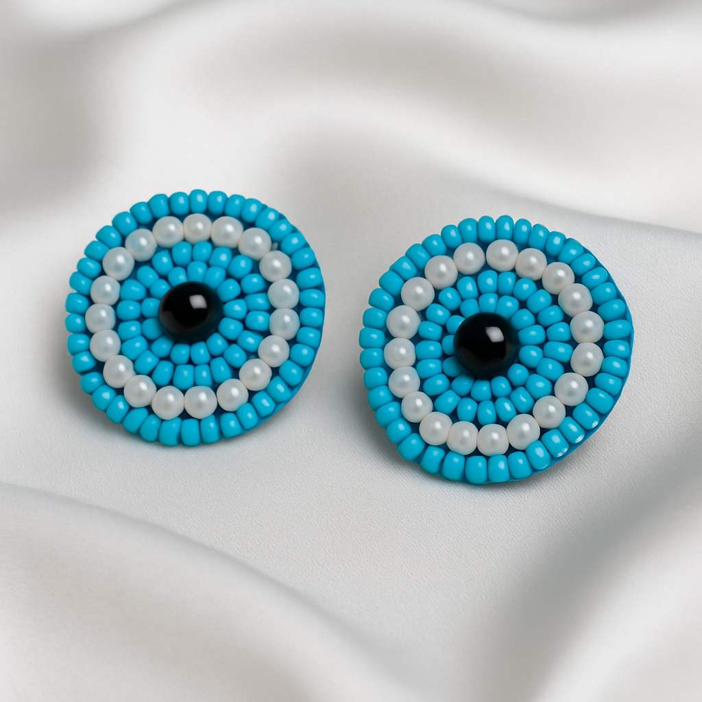 Handcrafted beaded blue earrings featuring the protective blue evil eye for style and positivity.